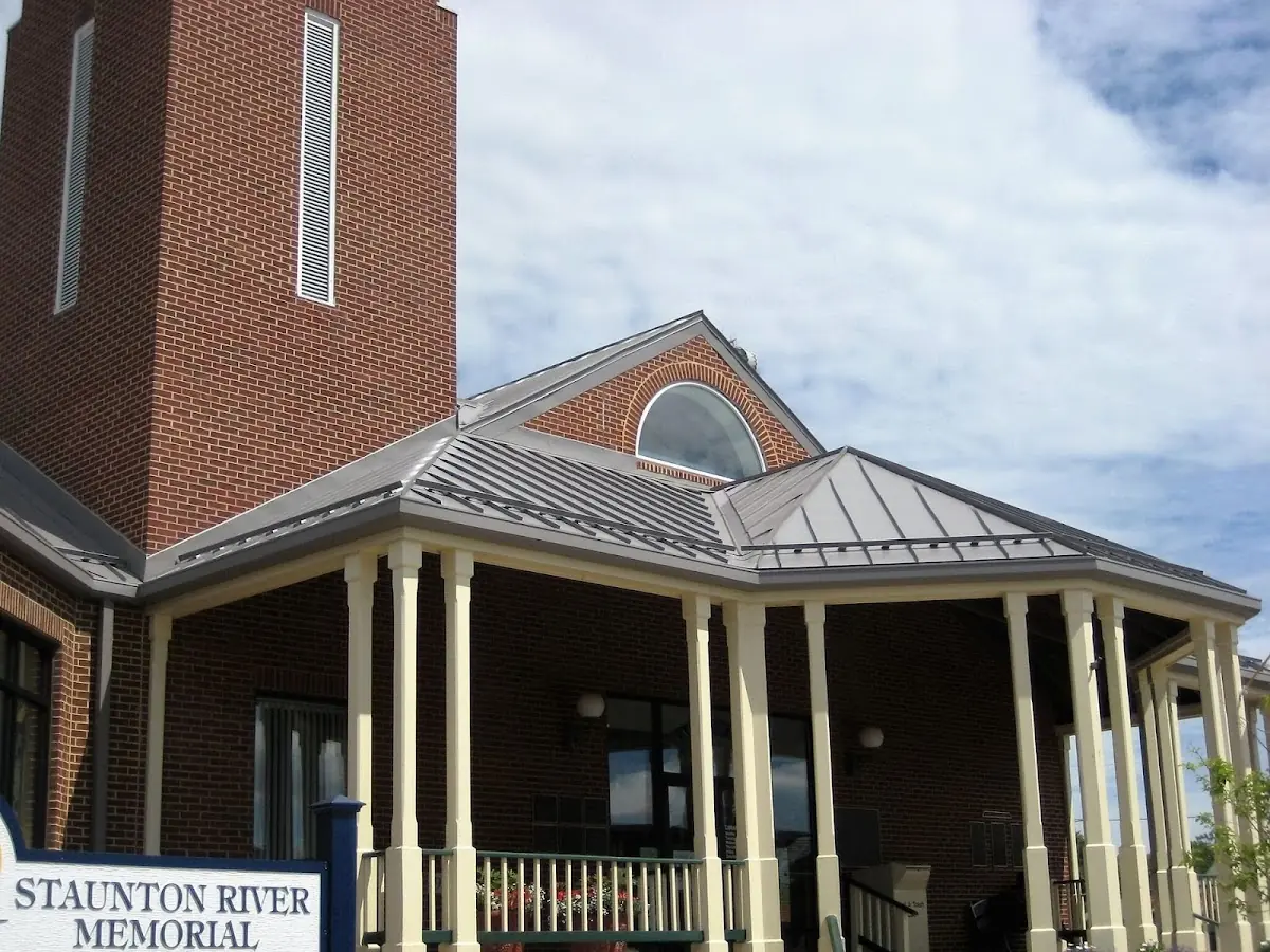 Skilled roofing craftsmen working on a residential roof in Beardstown